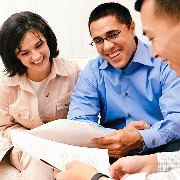 Couple speaking with loan officer